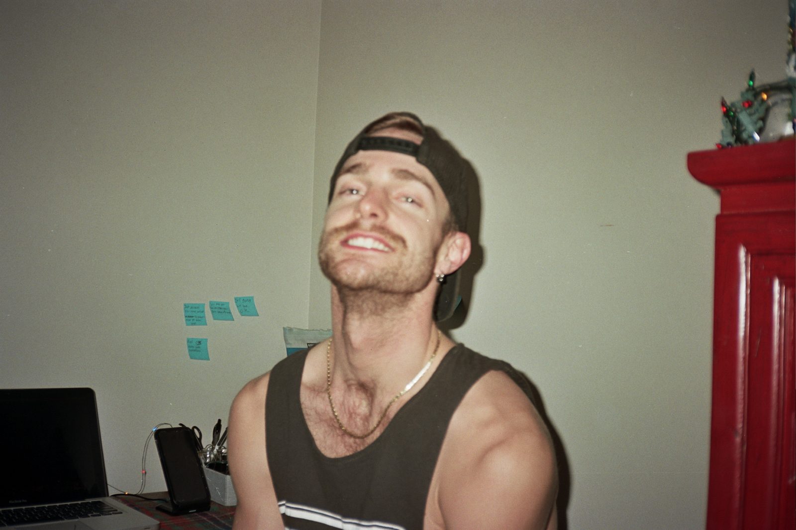 Figure laughing indoors
