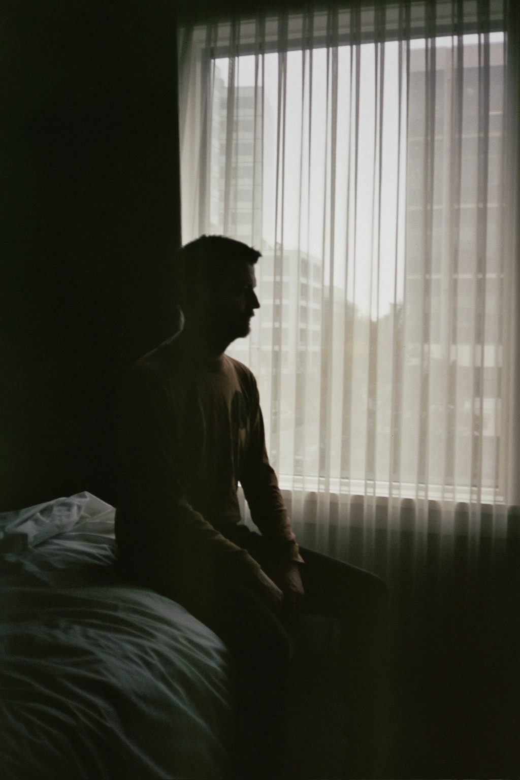 Silhouette by window