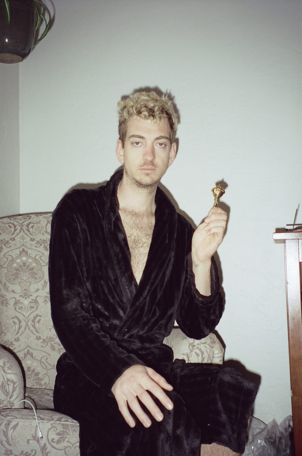 Figure in velvet robe