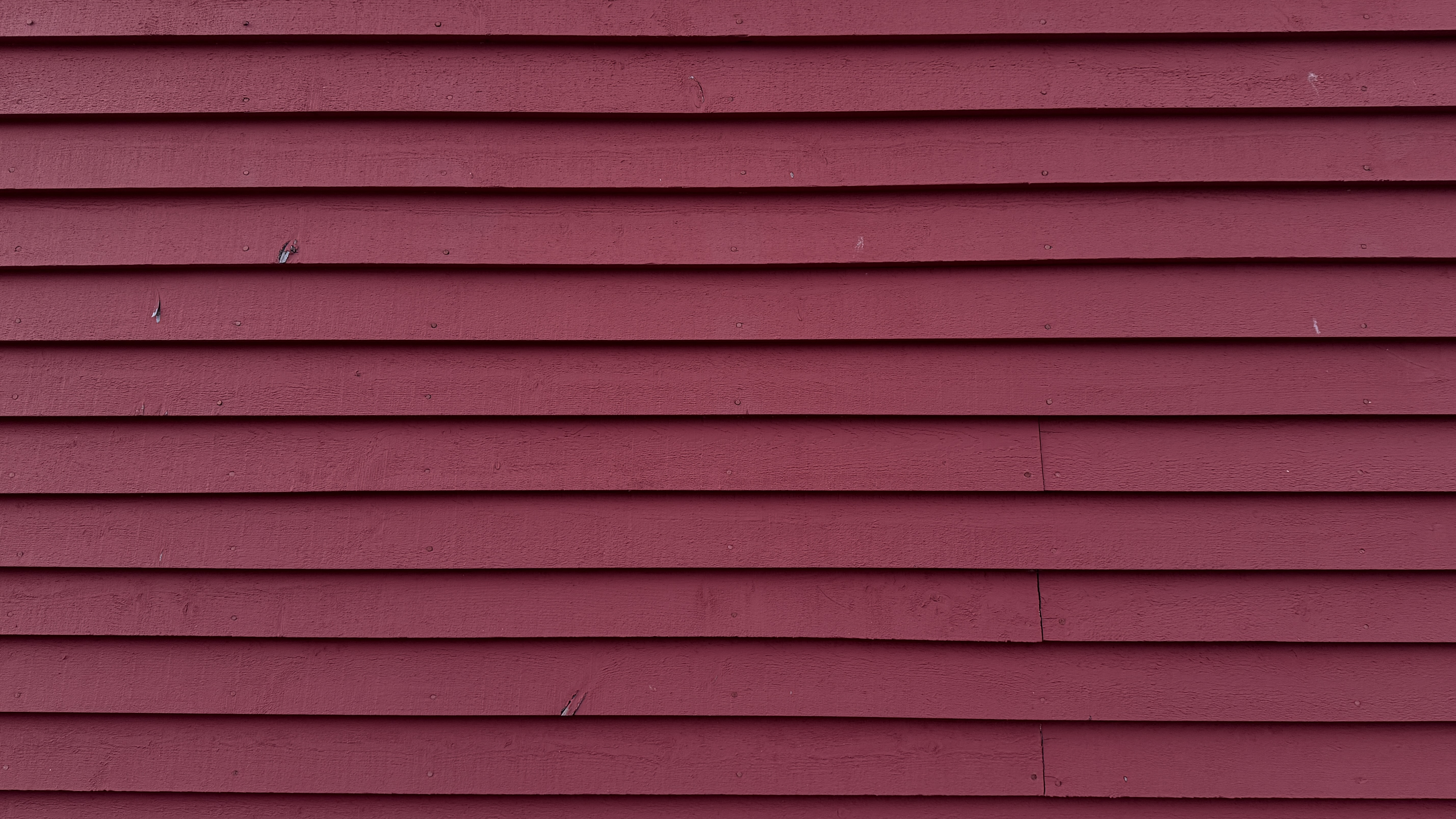 Deep red clapboard siding