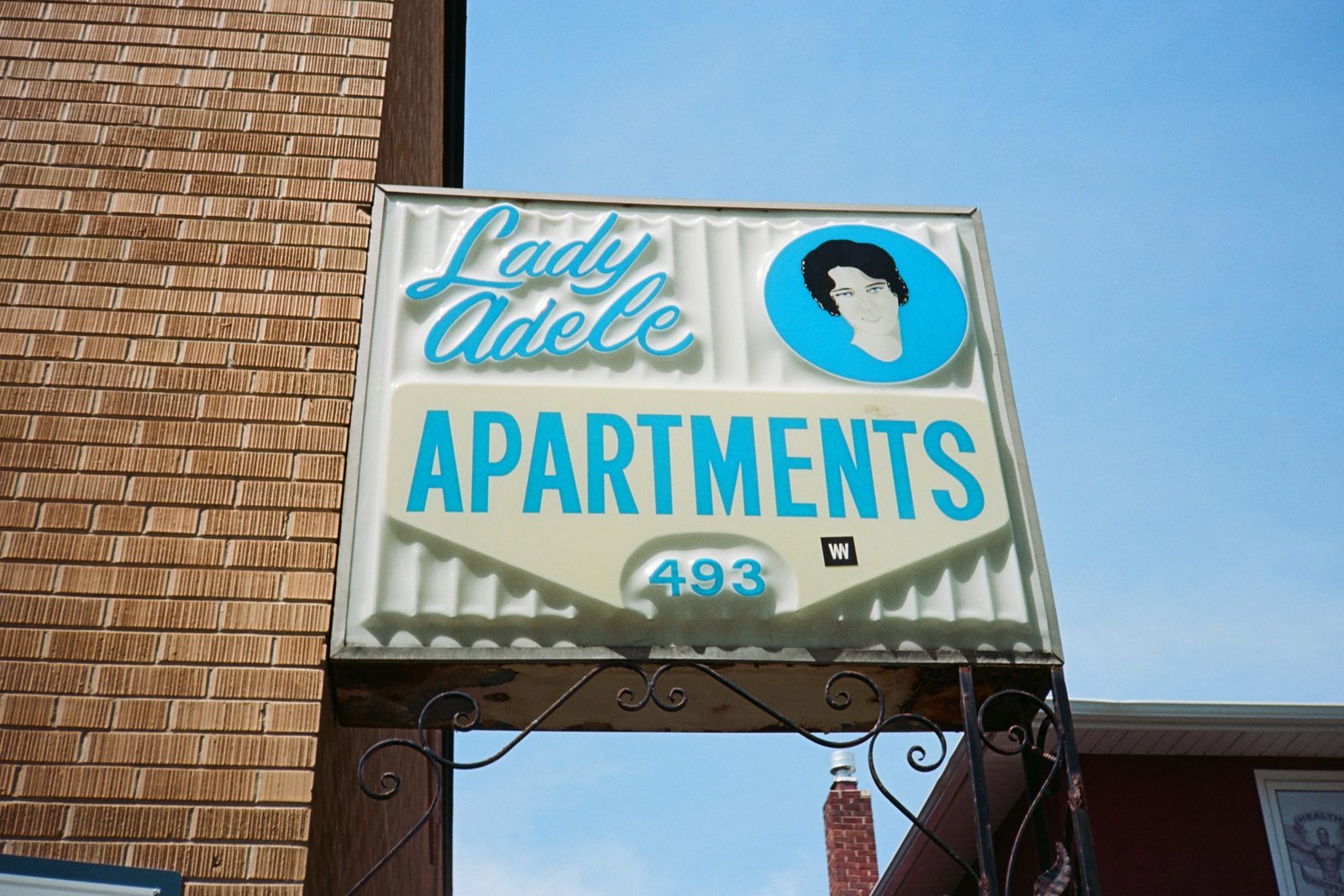 Lady Adele Apartments sign
