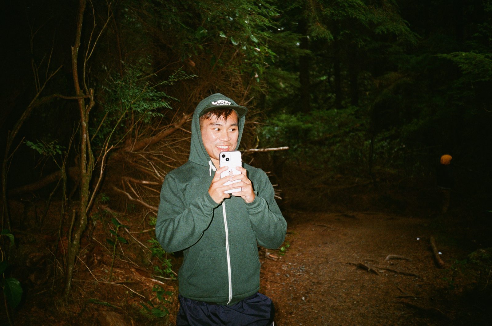 Figure in forest at night